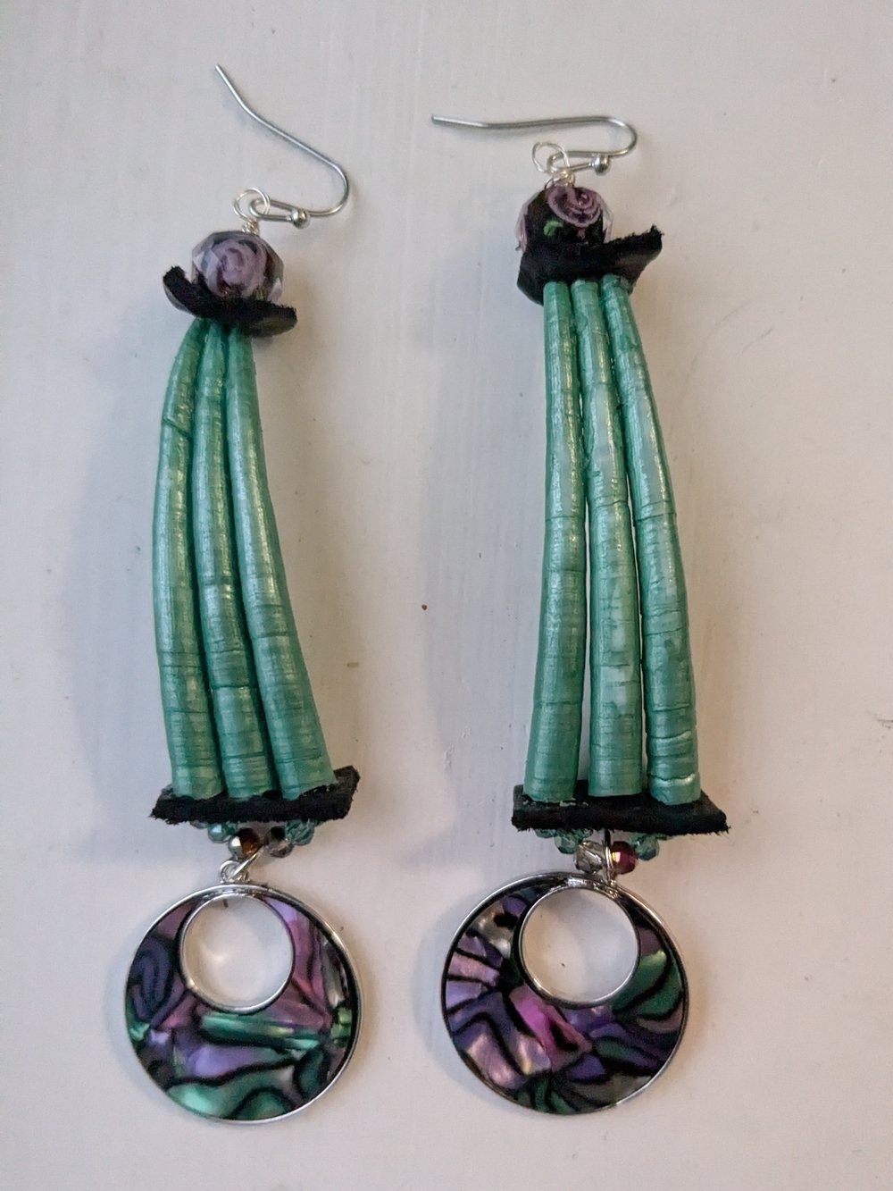 Indigenous Green Shell Earrings With Purple Accents